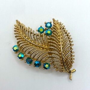 Vtg Lisner Blue AB Aurora Crystal Gold Tone Peacock Brooch 2.3”